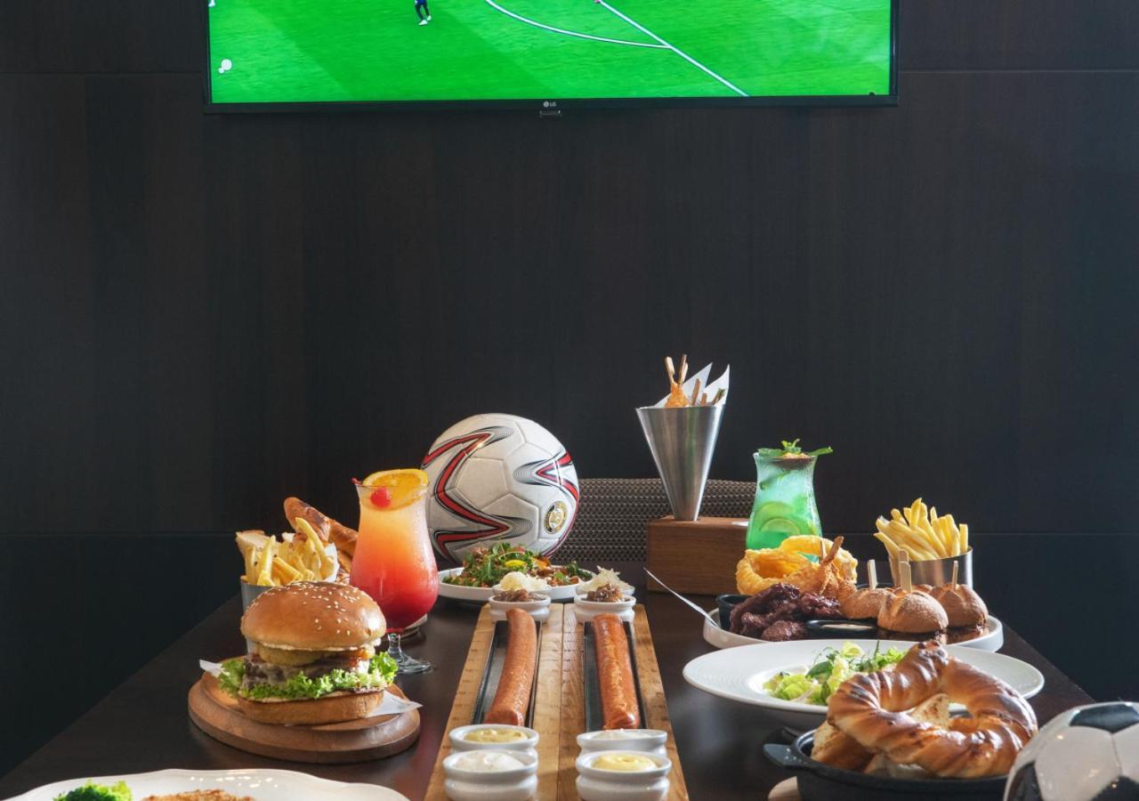 City Centre Rotana Doha Hotel Exterior photo A typical sports bar menu