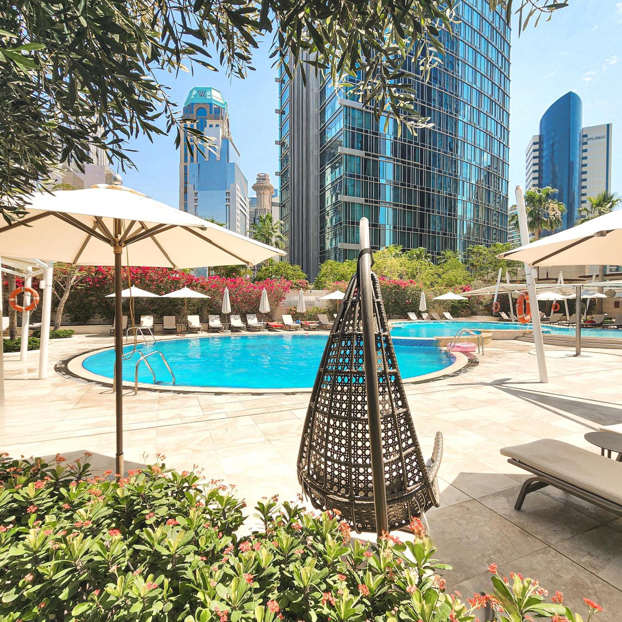 City Centre Rotana Doha Hotel Exterior photo The swimming pool at the hotel