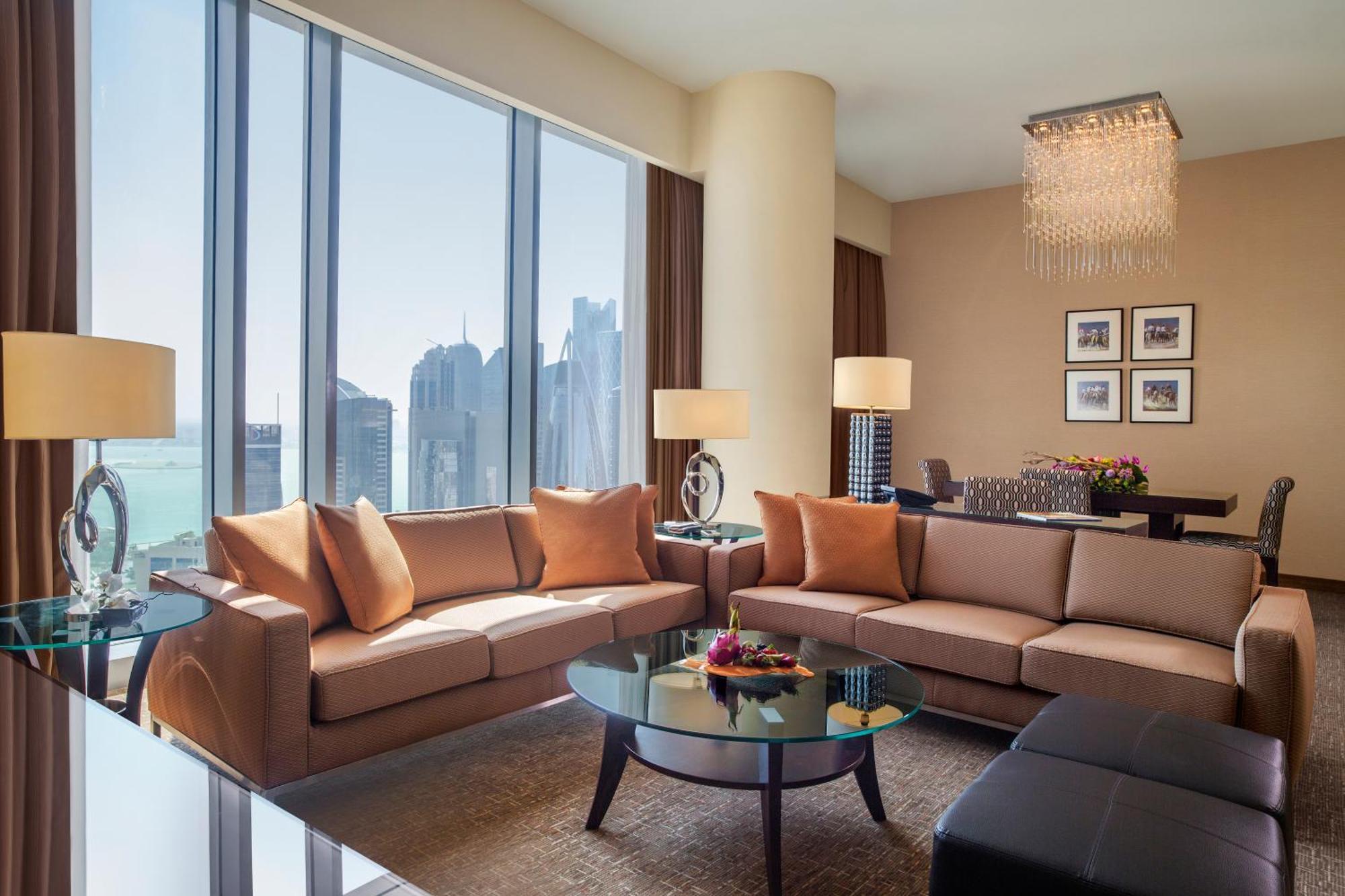 City Centre Rotana Doha Hotel Exterior photo A living room in a suite at the Ritz-Carlton, DIFC